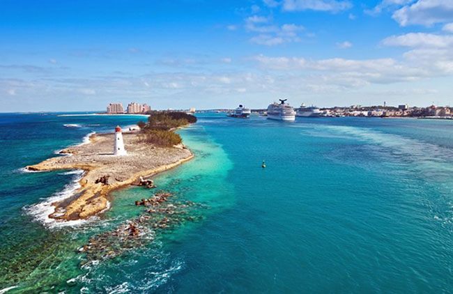 Lighthouse point and turquoise water in the Bahamas