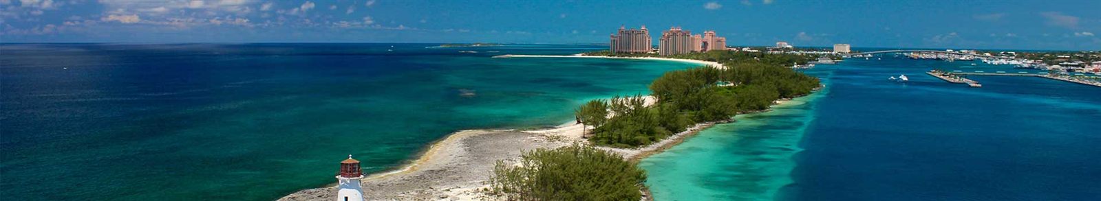 Shallow turquoise water and a sandy spit in the Bahamas