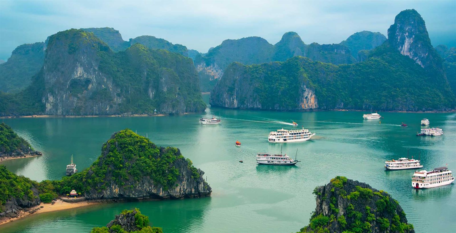 Boats among the limestone islands of Ha Long Bay, Vietnam